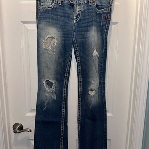 Distressed Blue Jeans